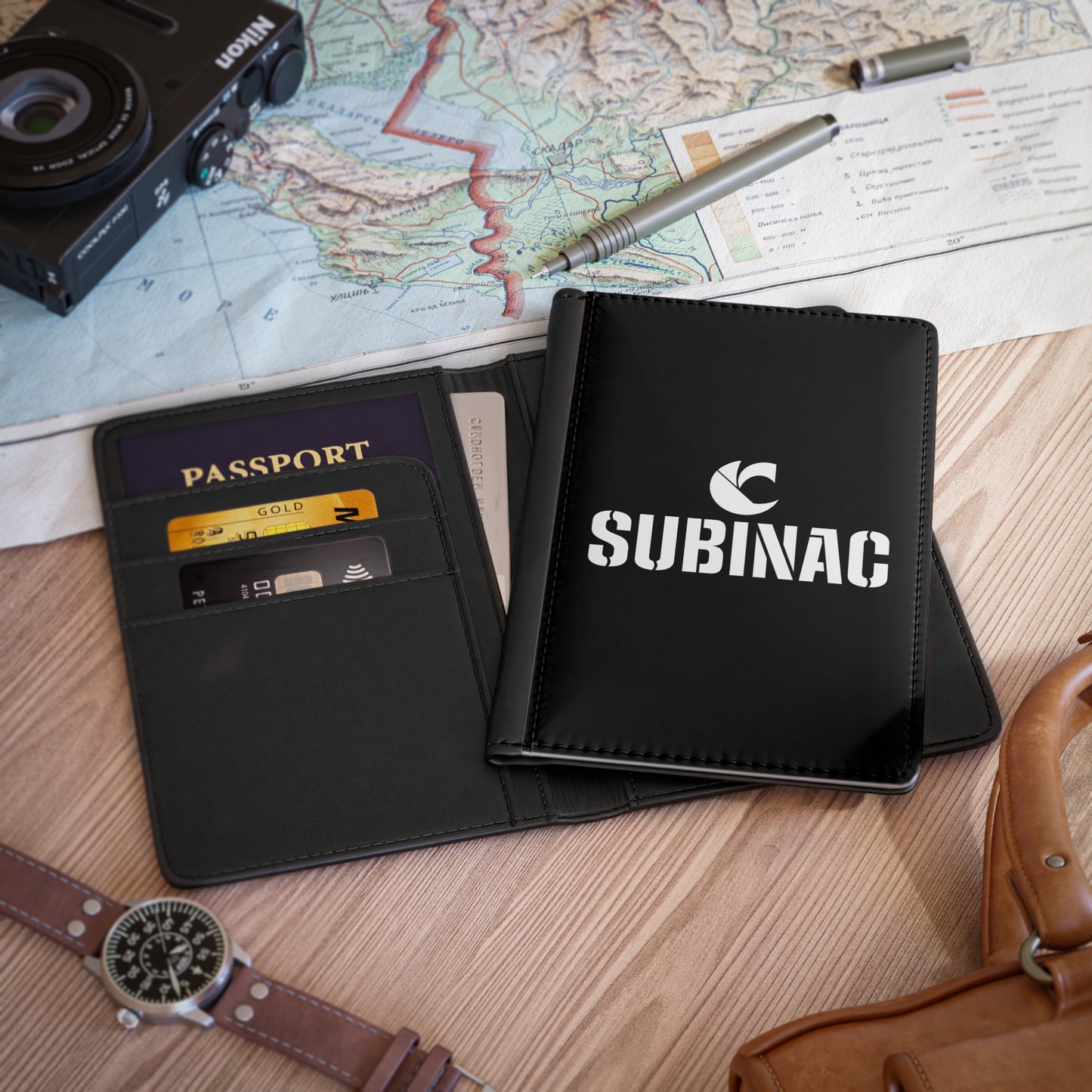 Sleek Black C-Logo Passport Cover w/ SUBINAC Design